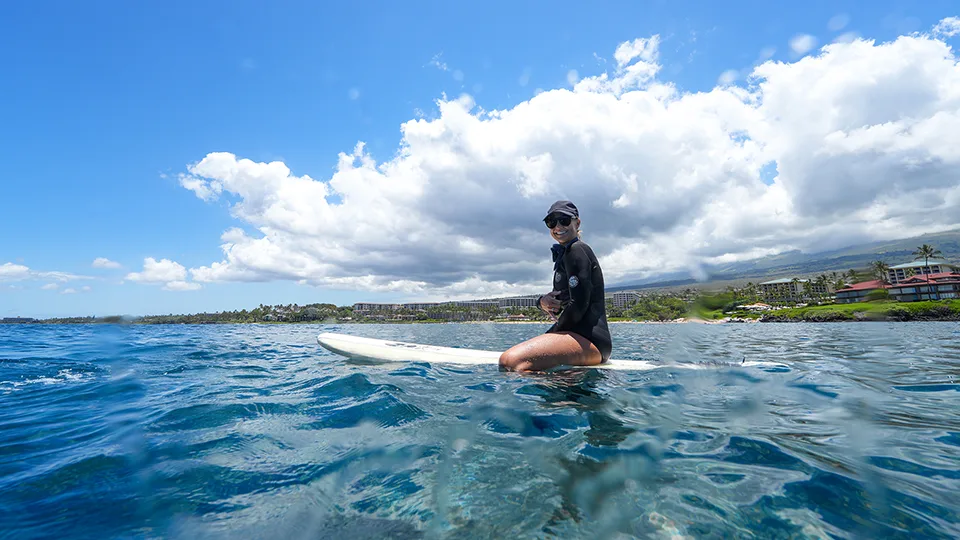 Pride of Maui Lifeguard on a Surfboard in the Water