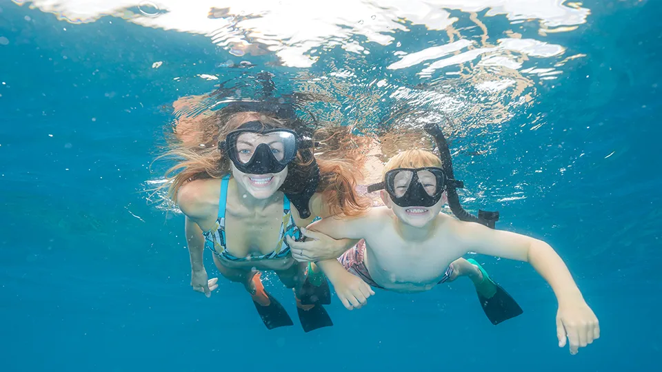 Guest and Son Snorkeling on Pride of Maui 'Elua Snorkel Tour