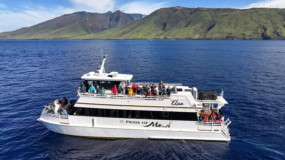 Aerial shot of Maui Food Bank team in Maui's waters aboard the Pride of Maui Elua vessel