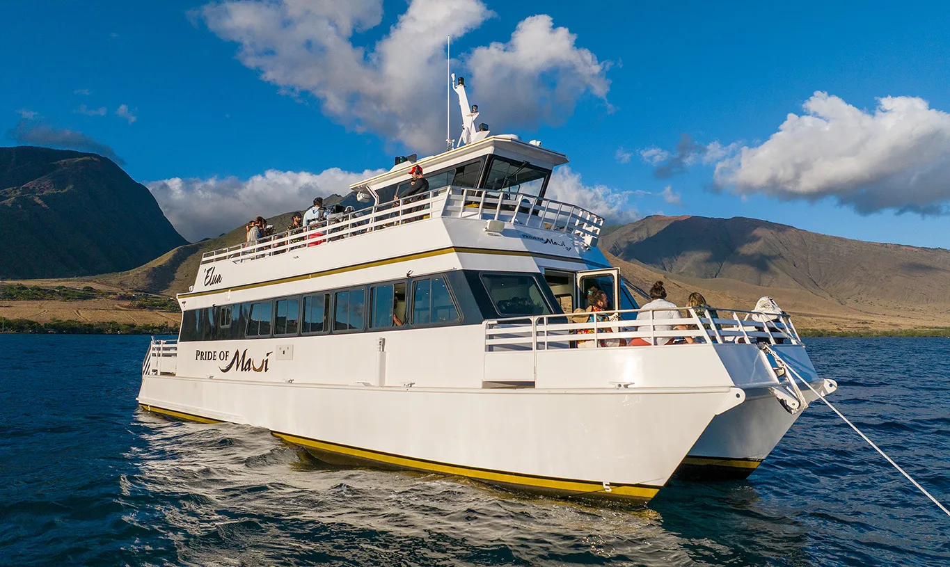 Pride of Maui ʻElua luxury power catamaran with guests aboard cruising Maui waters