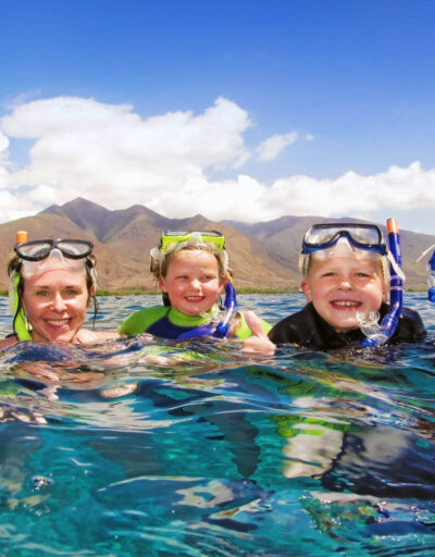 Family in the Water on a Pride of Maui Snorkel Cruise