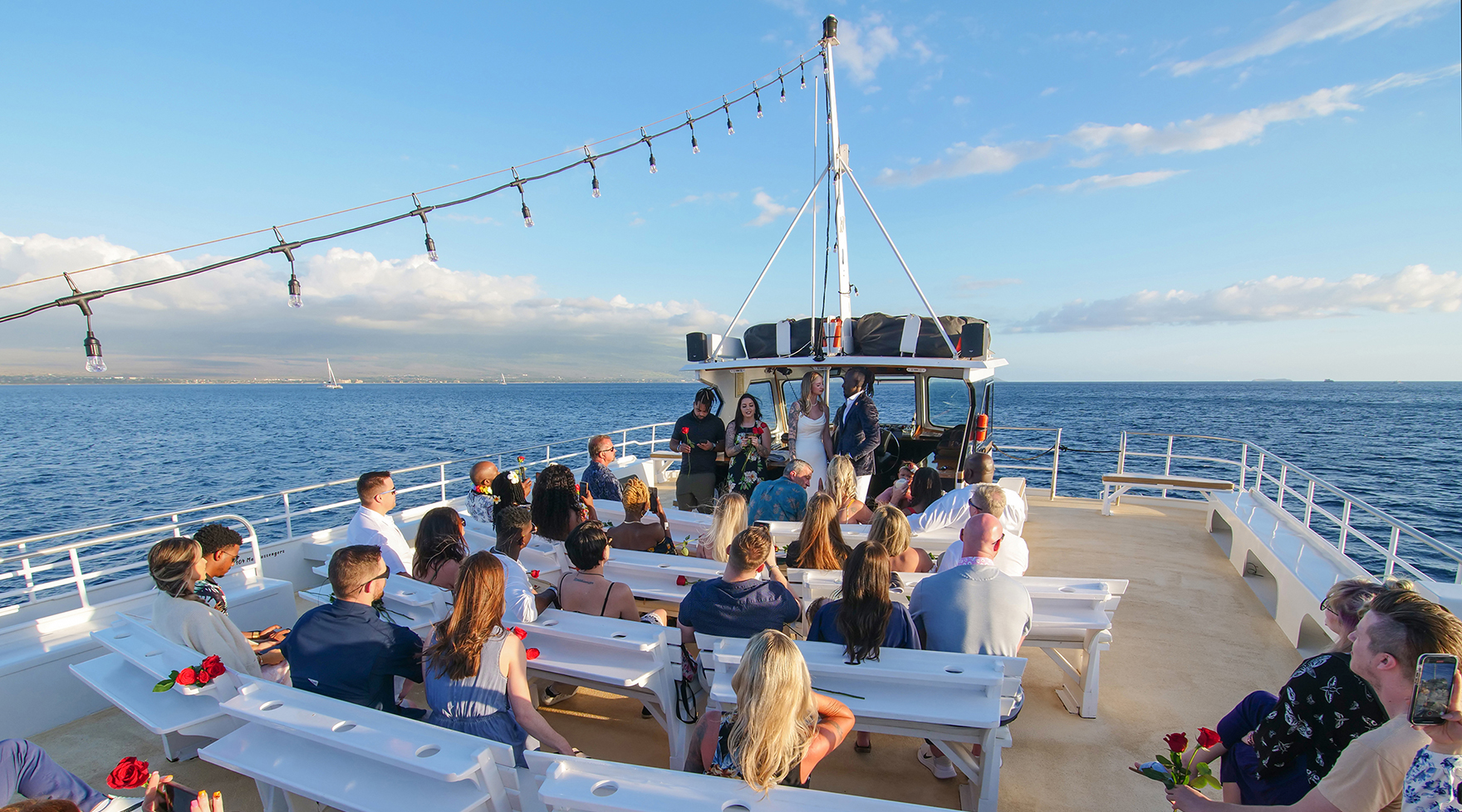 Guests on Top Deck During Wedding Ceremony on Pride of Maui Wedding Cruise