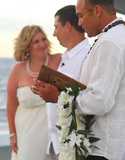 Couple During Ceremony on a Pride of Maui Wedding Cruise