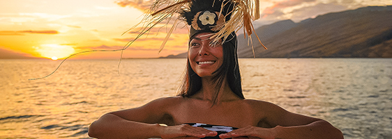 Hawaiian hula dancer performing at sunset during the Pride of Maui Sunset Dinner Cruise