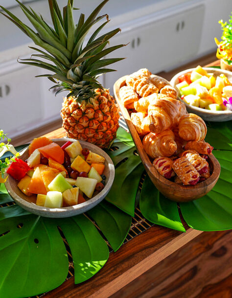 Breakfast spread on ‘Elua: fresh fruit and pastries before departure